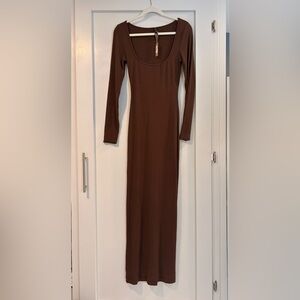 Skims long sleeve lounge dress is Cocoa